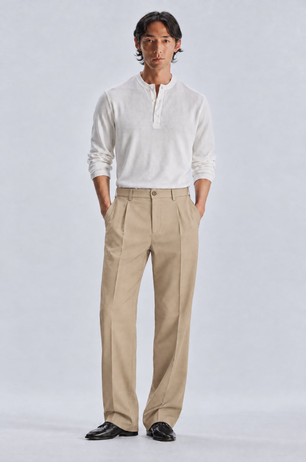 Beige Tailored Trousers styled with the white long sleeve henley, front