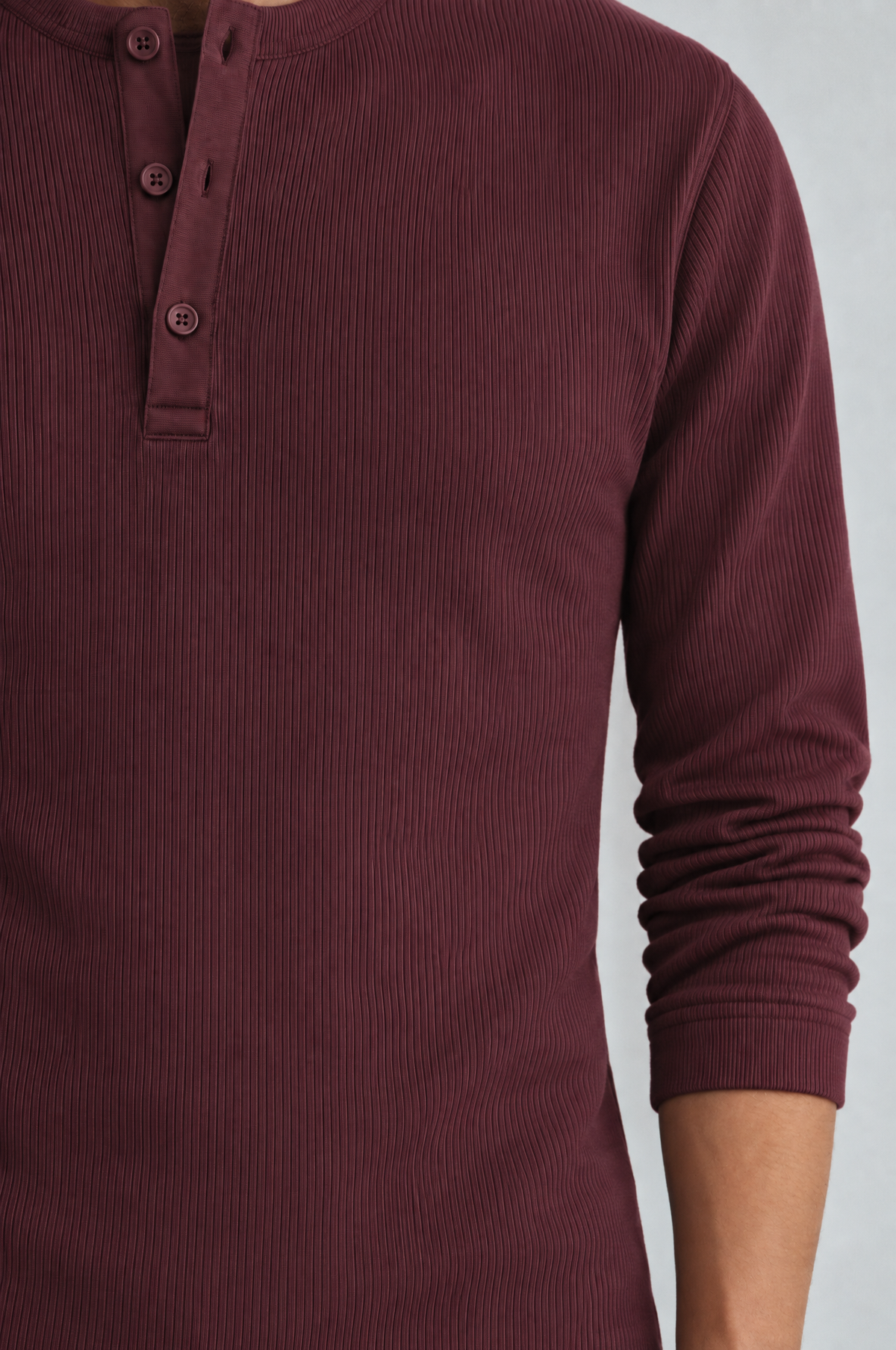 Burgundy long sleeve henley shirt, placket close-up