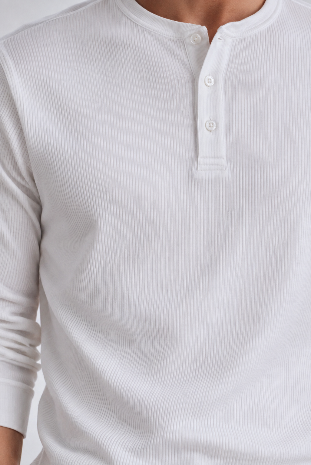 White long sleeve henley shirt, placket close-up